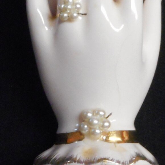 TILSO ... BUD VASE ... CERAMIC BUD VASE, HELD BY A HAND WITH RING AND BRACELET - Picture 4 of 9